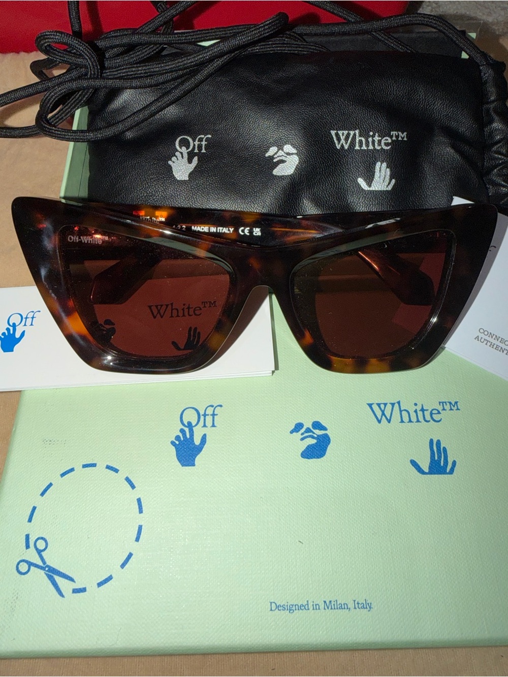 Off-White Tortoiseshell Cat Eye Sunglasses with Brown Lenses